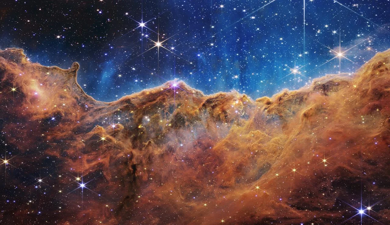 The star-forming Cosmic Cliffs in the Carina Nebula, imaged by Webb
